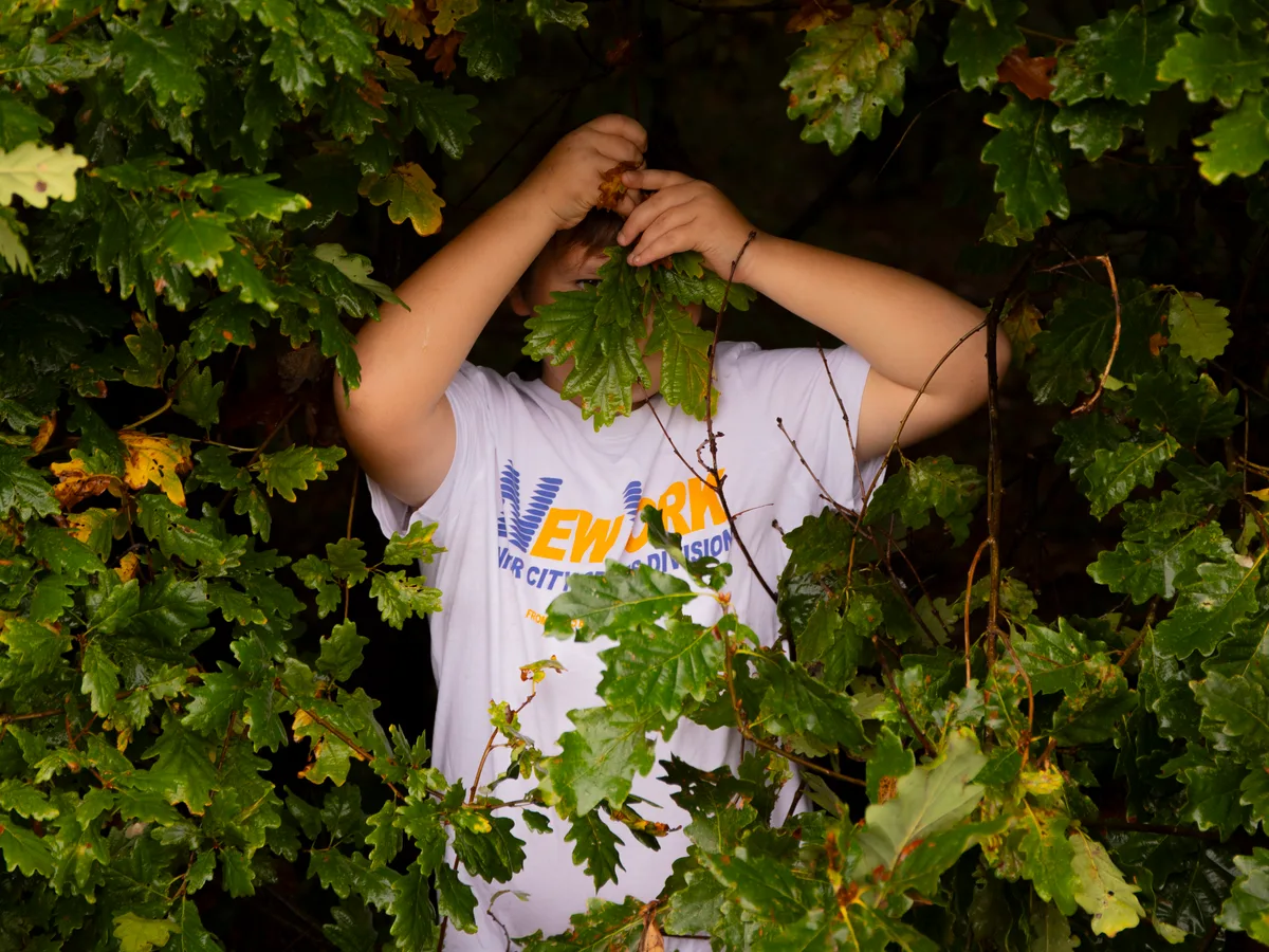 Staff member working with a young person at Maypole Farm — warm and relational